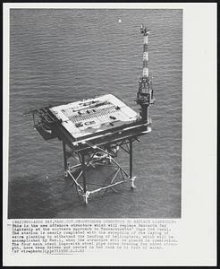 Offshore Structure to replace Lightship- This is the new offshore structure which will replace Buzzards Bay Lightship at the southern approach to Massachusetts' Cape Cod Canal. The station is nearly completed with the exception of the laying of extra planking to withstand the landing of helicopters, which will be accomplished by Nov. 1, when the structure will be placed in commission. The four main steel legs-with steel pipe cross bracing for added strength, have been driven and seated in bed rock in 61 feet of water.