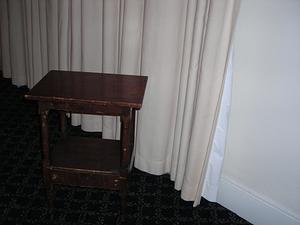 Side table with turned legs and shelf