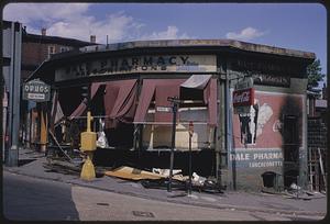 Pharmacy building with damaged front, corner of Dale Street and Washington Street, Roxbury, Boston