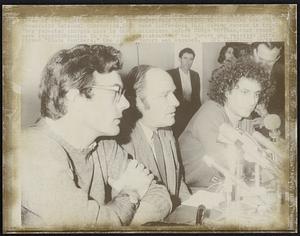 Rennie Davis (L), David Dellinger, (C) and Abbie Hoffman three of the eight men on trial conspiracy to incite riots during the 1968 Democratic National Convention, hold news conference 10/1 during recess in trial. They repeated charges made by their attorneys before Judge Hoffman, that there were inconsistencies in the court's treatment of two jurors who received letters signed "Black Panthers." One of the jurors was excused.