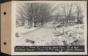 Contract No. 70, WPA Sewer Construction, Rutland, line "A", Main Street, looking back from manhole 6A, Rutland Sewer, Rutland, Mass., Feb. 26, 1941