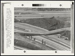 This is the BLUE printer showing collapsed overpass on the Golden State freeway in the San Fernando Valley after today's earthquake. Concrete area are grey, slopes separating freeways are green.