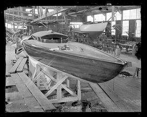 Boats in shed under construction