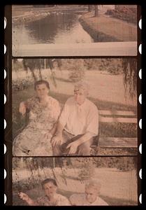 Two people seated on a bench