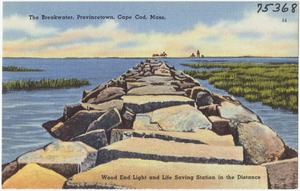 The breakwater, Provincetown, Cape Cod, Mass. Wood End Light and Life Saving Station in the distance.