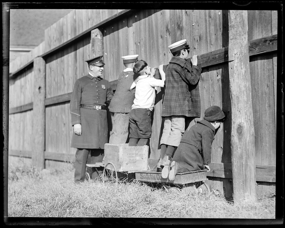 Cop joins baseball peakers at the fence