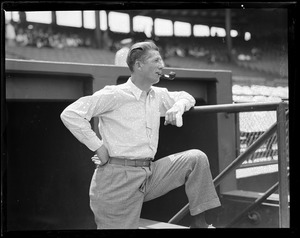 An injured Lefty Grove smoking a pipe