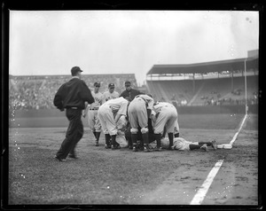Gehrig hurt at first, shows how quick the players covered him