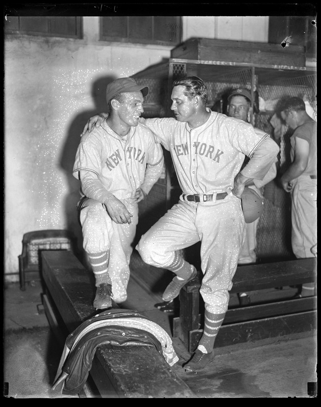 Manager Bill Terry, right, congratulates teammates after pennant victory, Braves Field