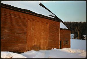 Snow-covered barn