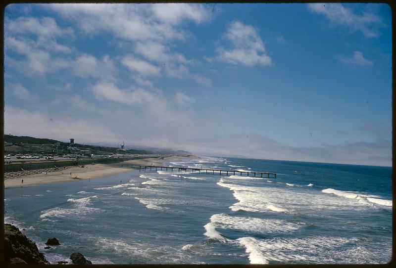 Seawall and shore along ocean with pier, Ocean Beach, San Francisco