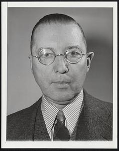 Carl William Ackerman. Educator. Born: Richmond, Indiana, Jan. 16, 1890. Educated: Student, Univ. of Chicago, 1910; Earlham College (Richmond), B.A., 1911, M.A., 1917; Columbia Univ. School of Journalism, B. Litt., 1913. Correspondent within central powers (World War 1), 1915-17. Special writer, New York Tribune, 1917. Correspondent in Mexico, Spain, France and Switzerland, 1917-18. Correspondent with Allied armies in Siberia, 1918-19. Director foreign news service, Philadelphia Public Ledger, 1919-21. President, Carl W. Ackerman, Inc., 1921-27. Assistant to president, General Motors Corp., 1930-31. Dean, Columbia Univ. School of Journalism, 1931-. Photographed in New York City, Mar. 28, 1947