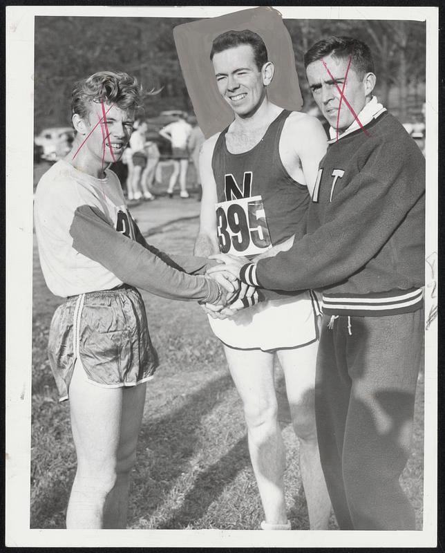 Happy Huskie Ed Shea (center), winner of the 41st running of New England Cross Country championship is congratulated by Boston U.'s Johnny Kelley (left) who finished second and third place finisher John Farquhar of M.I.T. (right). The 21-year-old Northeastern senior hails from Dedham.