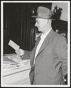 Burt Shotton Gets His Mail at hotel Kenmore before leaving for Braves Field and it looks like a letter from home, judging his smile. The Dodgers manager is making his first visit of the season to Boston and it looms as a busy week with five games scheduled with the Braves.