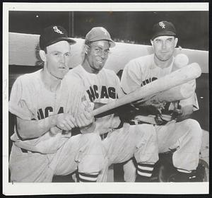 Big Socks For White Sox are three leading sluggers for Chicago (left to right) Second Baseman Nellie Fox, Outfielder Orestes Minoso and First sacker Eddie Robinson.