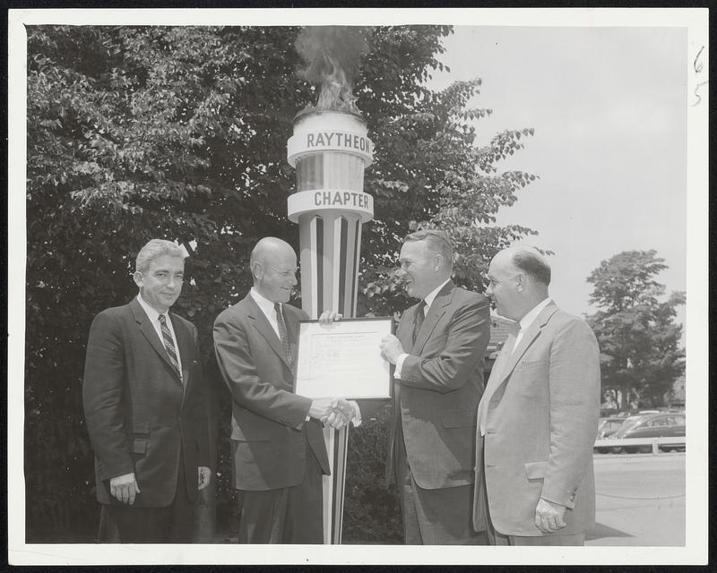 Torch Lightning Presentation - Charles F. Adams, Raytheon president and vice president in the United Fund (second right), receives United Fund membership charter certificate for his firm's employes. Making presentation is O. Kelley Anderson (second right), president of the New Mutual Life Insurance Co., and fund chairman. observing torch - lighting ceremony are Edward J. McDonald, left, and Joseph Connolly, right, union officials.