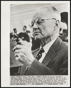 "Sherm" Checks up on Old Friends - Sherman Adams, former assistant to President Eisenhower checks up on the membership of standing committees as he returned to his old haunts in the New Hampshire State House. Adams a governor of New Hampshire before he went to Washington came to Concord from his home in Lincoln to testify against a bill that would ban Communists from speaking at state institutions.