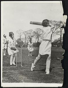 Girls Cricketers Warming Up. Girls are taking up cricket in England, and now it’s a popular sport with the ladies. Photo shows members of the Lyon’s Hotel Staffs team practicing for the forthcoming season in England.