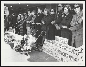 Linking Hands at War Memorial Auditorium, civil rights demonstrators paused in their march protesting racial imbalance in schools to sing the anthem of civil rights movement, "We Shall Overcome."