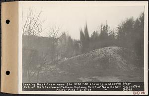 Contract No. 44, Extension of Belchertown-Pelham Highway, New Salem, Orange, looking back from near Sta. 1046+50 showing underfill blast, New Salem, Mass., Feb. 8, 1934