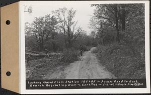 Contract No. 106, Improvement of Access Roads, Middle and East Branch Regulating Dams, and Quabbin Reservoir Area, Hardwick, Petersham, New Salem, Belchertown, looking ahead from Sta. 185+85, access road to East Branch Regulating Dam, Belchertown, Mass., May 21, 1940