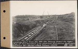 Contract No. 80, High Level Distribution Reservoir, Weston, looking west from Sta. 886+00+/- showing invert for upper pipe of twin aqueduct line, high level distribution reservoir, Weston, Mass., Apr. 2, 1940