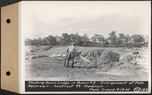 Contract No. 99, Enlargement of Fells High Level Distribution Reservoir, Stoneham, Malden, Melrose, washing down ledge in basin 2, enlargement of Fells Reservoir, Stoneham, Mass., Sep. 13, 1940