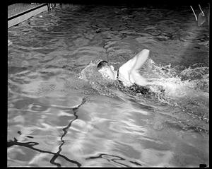 A swimmer swimming in a pool