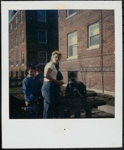 Susan Richards and group posing in Newtowne Court