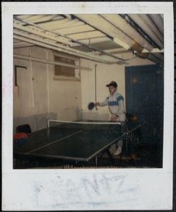 Boy playing ping pong