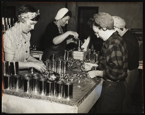 Inspection of meats before weighing and packing. Last step will be sterilizing for 25 minutes at 240 degrees in a retort which processes 1200 cans each run. Left to right, Thelma Hall, Hazel Robbins, Bertha Heyward and lena Mitchell.