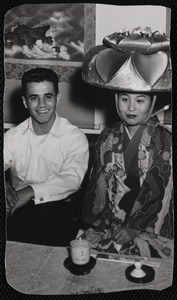 Young man with geisha in Teahouse of August Moon in Japan
