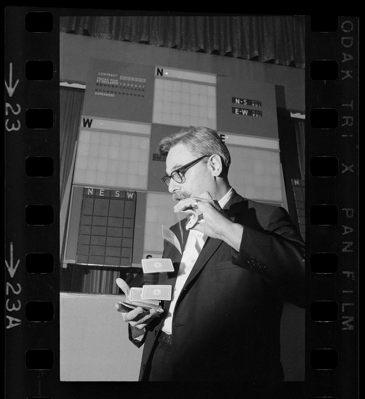 Shuffling the cards at a bridge players convention, Hynes Auditorium