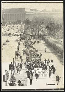 Lincoln Memorial forms a backdrop for the more than 2000 Vietnam veterans marching toward Arlington National cemetery in the first of a series of demonstrations against U.S. involvement in Indochina.
