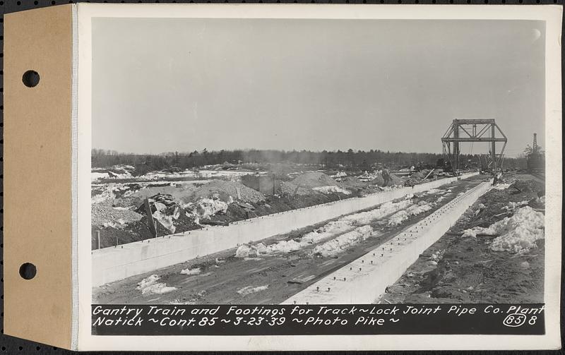 Contract No. 85, Manufacture and Delivery of Precast Concrete Steel Cylinder Pipe, Southborough, Framingham, Wayland, Natick, Weston, gantry train footings for track, Natick, Mass., Mar. 23, 1939