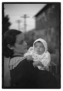 Mercedes Pasarell Sanromá holding a baby