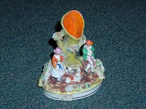 Staffordshire spill vase with figures