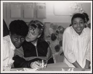 Three young people at a holiday party