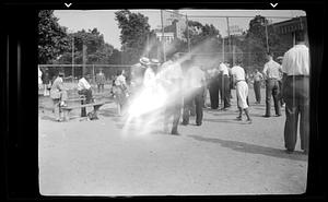 Duke Ellington Common softballers milling around