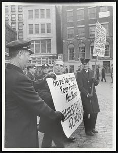 Mayor White passing picketing line of Bo. Firefighters at Faneuil Hall