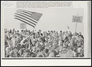 Freedom Rally--A crowd estimated at over 10,000 wave flags and hold signs during yesterday’s “Freedom Rally" in Washington to support President Nixon’s Vietnam policy. The Veterans Day demonstration was held on the grounds of the Washington Monument.
