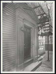 Vanishing Landmarks-These ancient doors are details of the last of Beacon Hill's "country houses," the Convent of St. Anne at 44 - 46 Temple street, which the city has condemned as unsafe. The door at the left, with its classic pediment, was put there by Bela Clapp, housewright, when he erected the building in 1787.