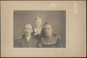 Mr. and Mrs. Hanscom shown with Willis, as a four year old