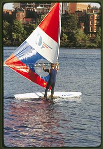 Boston 1981: A sailboarder sails the Charles River