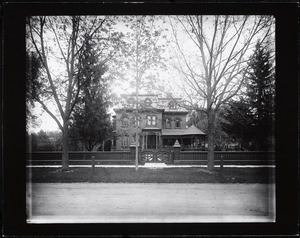 Italianate house with fence