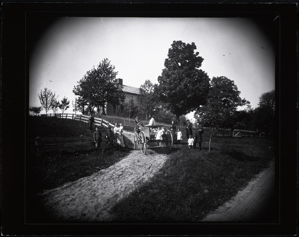 Group portrait with milk wagon