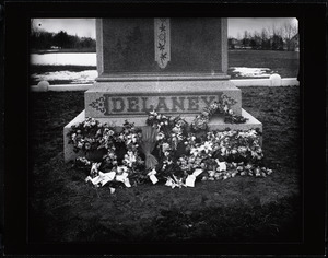 Delaney family monument with flower arrangements