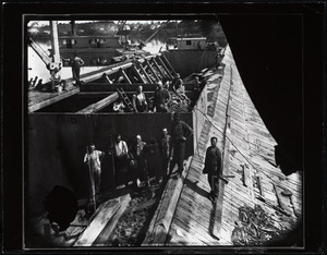 Workers reinforcing the Holyoke wooden dam