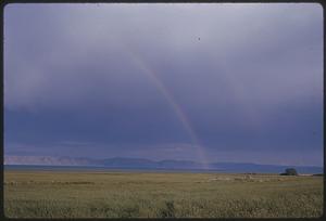 Landscape with mountains and rainbow, likely Utah