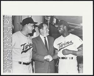 Humphrey was on Hand, But Game was Called -- Vice President Hubert Humphrey wishes luck to Minnesota Twins Pitcher Jim "Mudcat" Grant in Washington dressing room after night game with the Senators was postponed because of rain. Twins Manager Sam Mele is at left. The Vice President, former Minnesota Senator and Mayor of Minneapolis, had hoped to see Grant win his 20th game of the season and help the Twins win the American League pennant. The postponed game will be played as part of